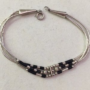 Native American liquid sterling silver and onyx bracelet